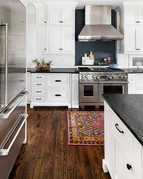 farmhouse kitchens with black countertops